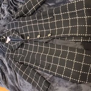 Wool black and white big plead coat just past the knee length by Ben Sherman